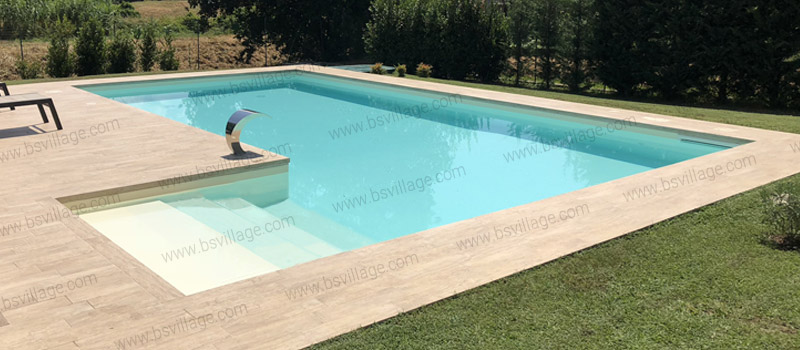 Piscina interrata in pannelli d'acciaio Italika con scala ad L