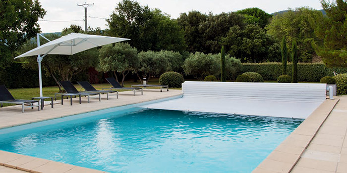 Copertura a tapparella di sicurezza fuori acqua OPEN CLASSIC per piscine rettangolari
