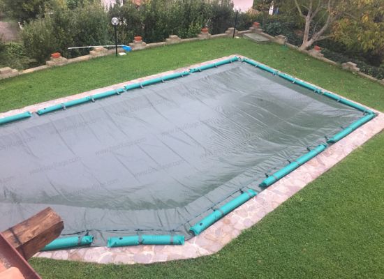 Progetti realizzati 4 - Copertura Invernale per piscina GEOCOVER PLUS 240 gr/m² con bretelle porta salsicciotti